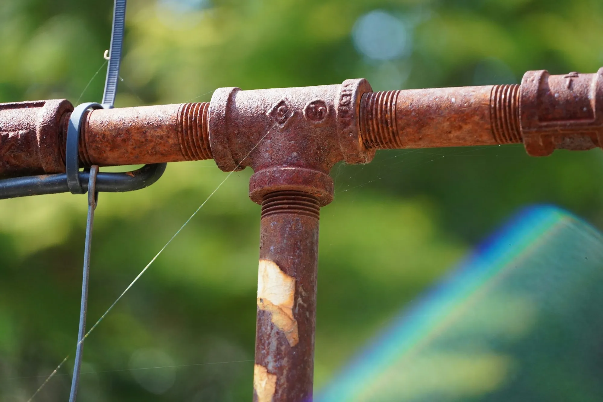 Iron & Sulfur Removal in Aliso Viejo, CA Rusty metal pipes joined in a T shape